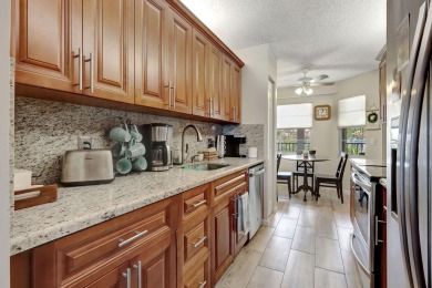 Stunning Lakefront 2 Bed, 2 Bath Condo in Century Village on Flamingo Lakes Country Club in Florida - for sale on GolfHomes.com, golf home, golf lot