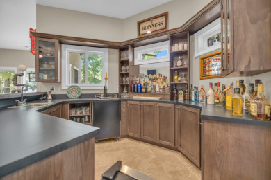 LAKEFRONT RETREAT on The Patriot Golf Club At Grand Harbor in South Carolina - for sale on GolfHomes.com, golf home, golf lot