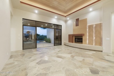 Set on a quiet cul-de-sac in gated Monument at Troon North, this on Troon North Golf Club  in Arizona - for sale on GolfHomes.com, golf home, golf lot