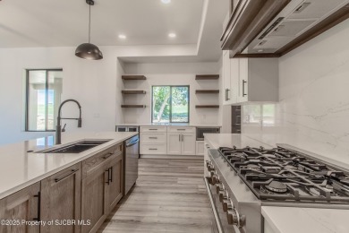 Experience refined living in this stunning 4-bedroom, 3-bath on San Juan Country Club in New Mexico - for sale on GolfHomes.com, golf home, golf lot