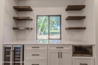Experience refined living in this stunning 4-bedroom, 3-bath on San Juan Country Club in New Mexico - for sale on GolfHomes.com, golf home, golf lot