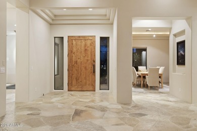 Set on a quiet cul-de-sac in gated Monument at Troon North, this on Troon North Golf Club  in Arizona - for sale on GolfHomes.com, golf home, golf lot