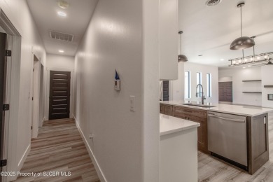 Experience refined living in this stunning 4-bedroom, 3-bath on San Juan Country Club in New Mexico - for sale on GolfHomes.com, golf home, golf lot