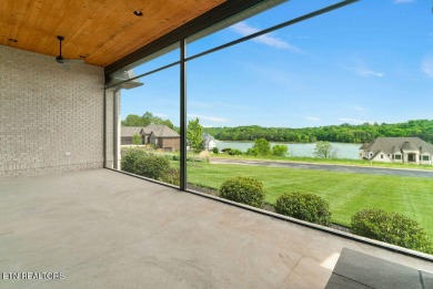This luxurious, better than new home is located in the Rarity on Rarity Bay Country Club - Loudon in Tennessee - for sale on GolfHomes.com, golf home, golf lot