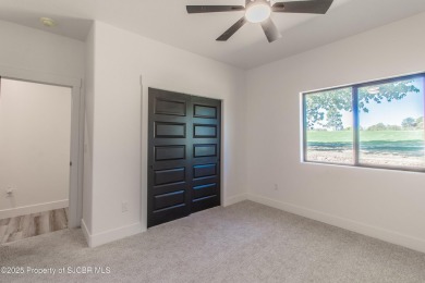 Experience refined living in this stunning 4-bedroom, 3-bath on San Juan Country Club in New Mexico - for sale on GolfHomes.com, golf home, golf lot