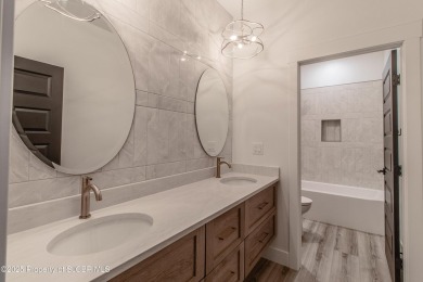 Experience refined living in this stunning 4-bedroom, 3-bath on San Juan Country Club in New Mexico - for sale on GolfHomes.com, golf home, golf lot