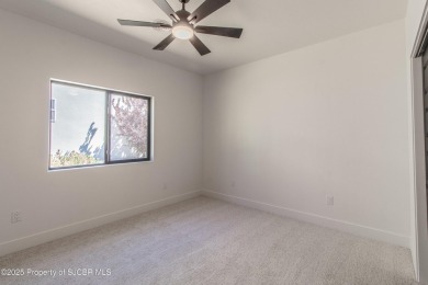Experience refined living in this stunning 4-bedroom, 3-bath on San Juan Country Club in New Mexico - for sale on GolfHomes.com, golf home, golf lot