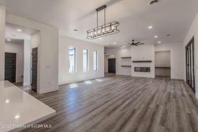 Experience refined living in this stunning 4-bedroom, 3-bath on San Juan Country Club in New Mexico - for sale on GolfHomes.com, golf home, golf lot