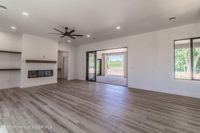 Experience refined living in this stunning 4-bedroom, 3-bath on San Juan Country Club in New Mexico - for sale on GolfHomes.com, golf home, golf lot