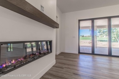 Experience refined living in this stunning 4-bedroom, 3-bath on San Juan Country Club in New Mexico - for sale on GolfHomes.com, golf home, golf lot