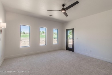 Experience refined living in this stunning 4-bedroom, 3-bath on San Juan Country Club in New Mexico - for sale on GolfHomes.com, golf home, golf lot