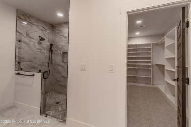 Experience refined living in this stunning 4-bedroom, 3-bath on San Juan Country Club in New Mexico - for sale on GolfHomes.com, golf home, golf lot
