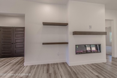 Experience refined living in this stunning 4-bedroom, 3-bath on San Juan Country Club in New Mexico - for sale on GolfHomes.com, golf home, golf lot
