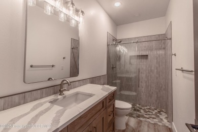Experience refined living in this stunning 4-bedroom, 3-bath on San Juan Country Club in New Mexico - for sale on GolfHomes.com, golf home, golf lot