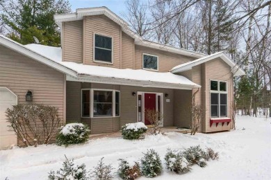 Discover the perfect blend of privacy and convenience in this on Charlevoix Golf and Country Club in Michigan - for sale on GolfHomes.com, golf home, golf lot