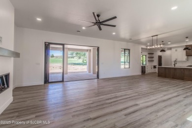 Experience refined living in this stunning 4-bedroom, 3-bath on San Juan Country Club in New Mexico - for sale on GolfHomes.com, golf home, golf lot