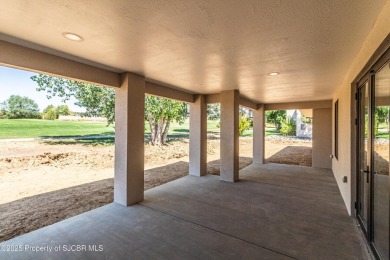 Experience refined living in this stunning 4-bedroom, 3-bath on San Juan Country Club in New Mexico - for sale on GolfHomes.com, golf home, golf lot