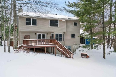 Discover the perfect blend of privacy and convenience in this on Charlevoix Golf and Country Club in Michigan - for sale on GolfHomes.com, golf home, golf lot