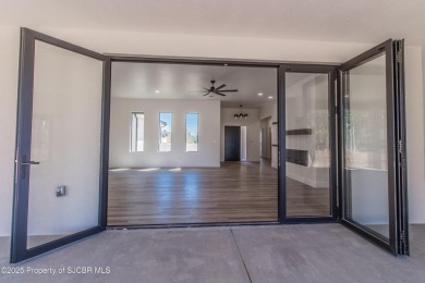 Experience refined living in this stunning 4-bedroom, 3-bath on San Juan Country Club in New Mexico - for sale on GolfHomes.com, golf home, golf lot