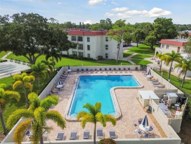 Under contract-accepting backup offers. ***SIGNIFICANT PRICE on The Dunedin Country Club in Florida - for sale on GolfHomes.com, golf home, golf lot