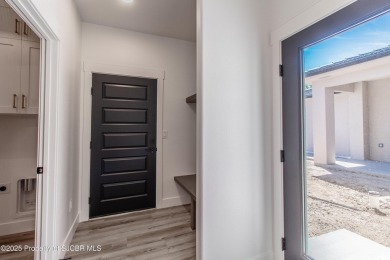 Experience refined living in this stunning 4-bedroom, 3-bath on San Juan Country Club in New Mexico - for sale on GolfHomes.com, golf home, golf lot