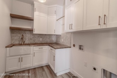 Experience refined living in this stunning 4-bedroom, 3-bath on San Juan Country Club in New Mexico - for sale on GolfHomes.com, golf home, golf lot
