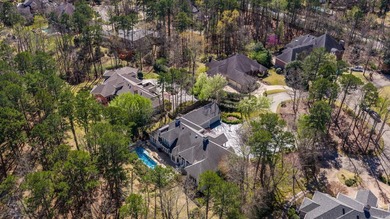 Overlooking the scenic fairways and tranquil lakes of Chenal's on Chenal Country Club - Bear Den Mountain in Arkansas - for sale on GolfHomes.com, golf home, golf lot