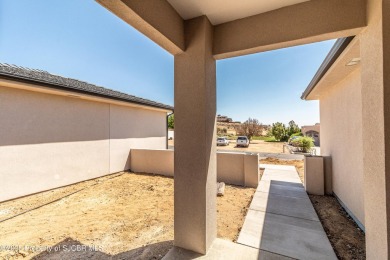 Experience refined living in this stunning 4-bedroom, 3-bath on San Juan Country Club in New Mexico - for sale on GolfHomes.com, golf home, golf lot