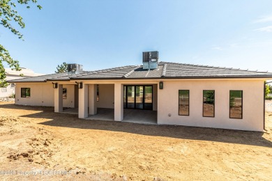 Experience refined living in this stunning 4-bedroom, 3-bath on San Juan Country Club in New Mexico - for sale on GolfHomes.com, golf home, golf lot
