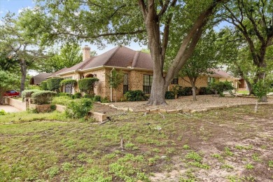 This charming home bursting with potential is the perfect canvas on De Cordova Bend Country Club in Texas - for sale on GolfHomes.com, golf home, golf lot