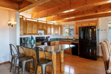 Come see this fully furnished, updated, rustic cabin in on Bear Lake West Golf and Country Club in Idaho - for sale on GolfHomes.com, golf home, golf lot