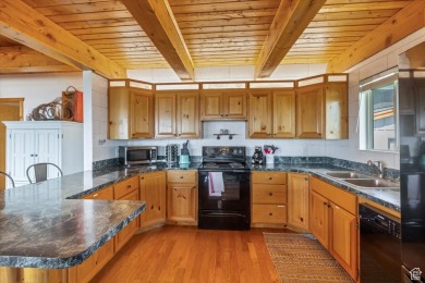 Come see this fully furnished, updated, rustic cabin in on Bear Lake West Golf and Country Club in Idaho - for sale on GolfHomes.com, golf home, golf lot