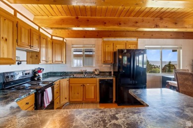 Come see this fully furnished, updated, rustic cabin in on Bear Lake West Golf and Country Club in Idaho - for sale on GolfHomes.com, golf home, golf lot