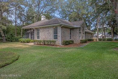 Tranquil country club living in a gated community in this 3BR/2 on Magnolia Point Golf and Country Club in Florida - for sale on GolfHomes.com, golf home, golf lot