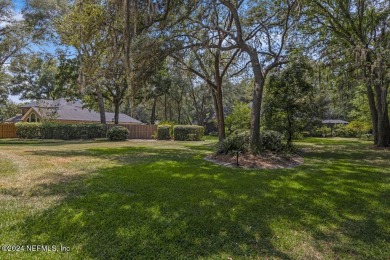 Tranquil country club living in a gated community in this 3BR/2 on Magnolia Point Golf and Country Club in Florida - for sale on GolfHomes.com, golf home, golf lot