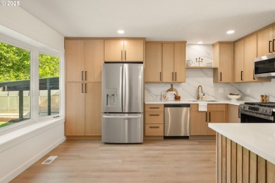 Don't miss this stunning 5-bedroom, 3-bathroom home where modern on Lake Oswego Municipal Golf Course in Oregon - for sale on GolfHomes.com, golf home, golf lot