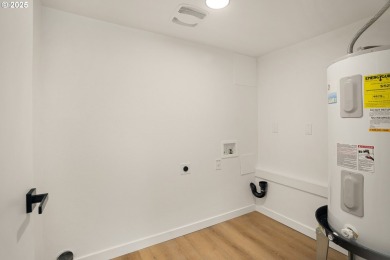 Don't miss this stunning 5-bedroom, 3-bathroom home where modern on Lake Oswego Municipal Golf Course in Oregon - for sale on GolfHomes.com, golf home, golf lot