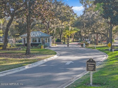 Tranquil country club living in a gated community in this 3BR/2 on Magnolia Point Golf and Country Club in Florida - for sale on GolfHomes.com, golf home, golf lot