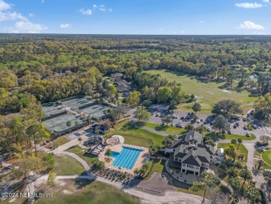 Tranquil country club living in a gated community in this 3BR/2 on Magnolia Point Golf and Country Club in Florida - for sale on GolfHomes.com, golf home, golf lot