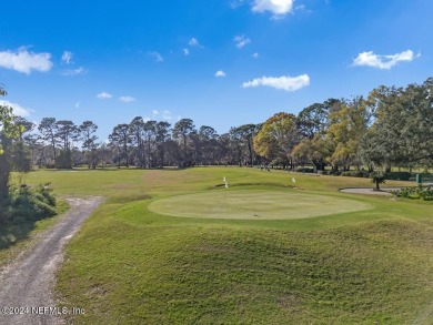 Tranquil country club living in a gated community in this 3BR/2 on Magnolia Point Golf and Country Club in Florida - for sale on GolfHomes.com, golf home, golf lot