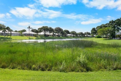 Welcome home to this 2 bedroom, 2 bath, 2 car garage villa in on Monarch Country Club in Florida - for sale on GolfHomes.com, golf home, golf lot