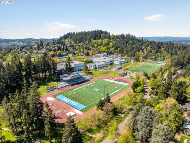 Don't miss this stunning 5-bedroom, 3-bathroom home where modern on Lake Oswego Municipal Golf Course in Oregon - for sale on GolfHomes.com, golf home, golf lot