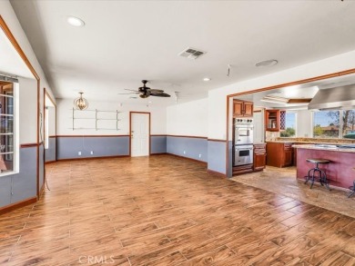 Welcome to this beautifully updated 2,055 sq ft home, ideally on Roadrunner Dunes Golf Course in California - for sale on GolfHomes.com, golf home, golf lot