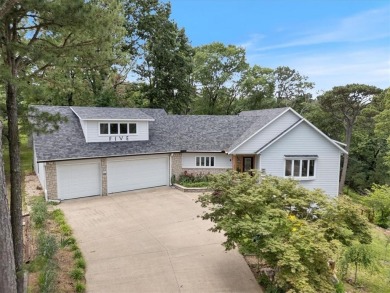 This exquisite custom home features breathtaking views of miles on Holiday Island Golf Course in Arkansas - for sale on GolfHomes.com, golf home, golf lot