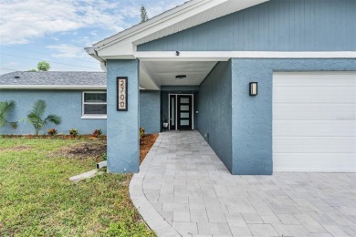Welcome to your dream home in the heart of Countryside. This on Countryside Country Club in Florida - for sale on GolfHomes.com, golf home, golf lot