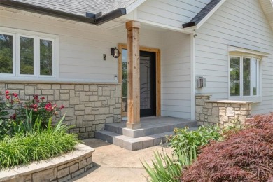 This exquisite custom home features breathtaking views of miles on Holiday Island Golf Course in Arkansas - for sale on GolfHomes.com, golf home, golf lot