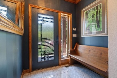 This exquisite custom home features breathtaking views of miles on Holiday Island Golf Course in Arkansas - for sale on GolfHomes.com, golf home, golf lot