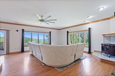 This exquisite custom home features breathtaking views of miles on Holiday Island Golf Course in Arkansas - for sale on GolfHomes.com, golf home, golf lot