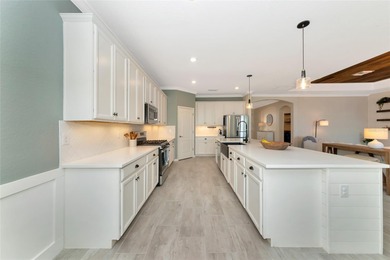 Under contract-accepting backup offers. This Summerville model on Lakewood National Golf Club in Florida - for sale on GolfHomes.com, golf home, golf lot