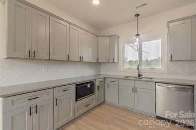 Discover the perfect blend of new construction and lifestyle in on Piney Point Golf Club in North Carolina - for sale on GolfHomes.com, golf home, golf lot